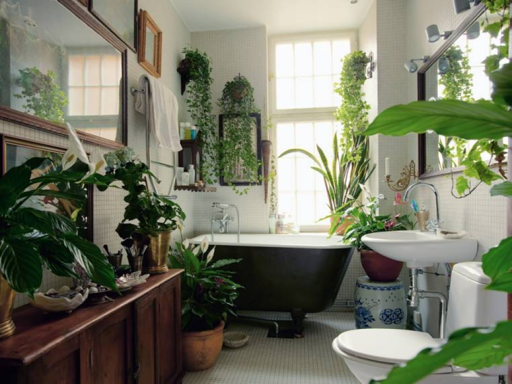Bathroom garden tub with lush greenery and relaxing decor ideas