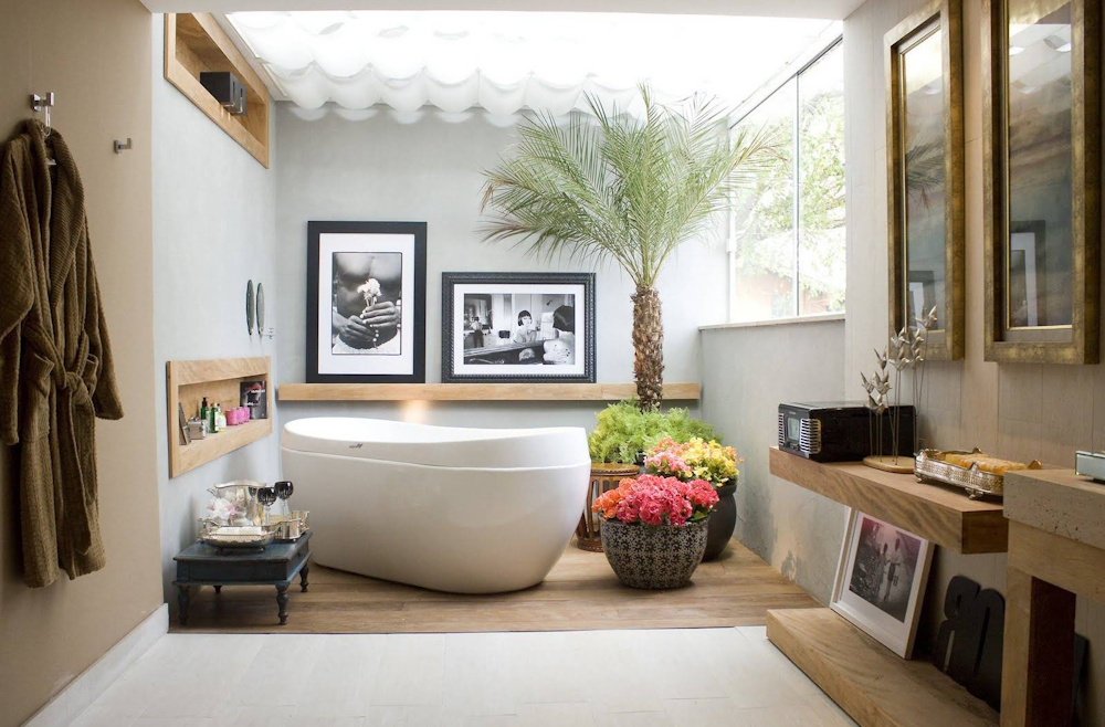 Decorative bathroom garden tub surrounded by cozy botanical accents