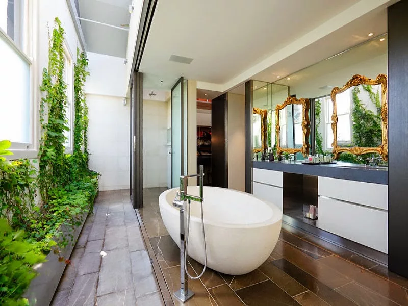 Garden-inspired bathroom tub decor with elegant botanical touches